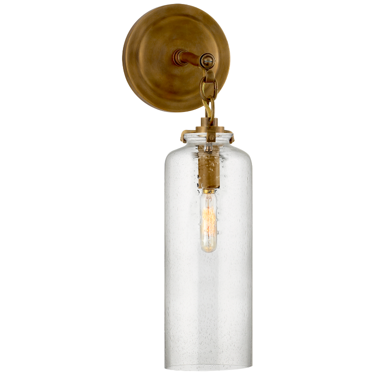 Picture of Katie Small Cylinder Sconce in Hand-Rubbed Antique Brass with Seeded Glass